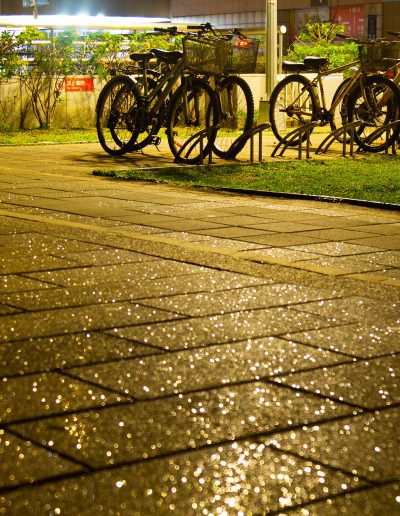 Taipei sidewalk with bicycles