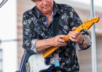 The Carl Verheyen Band performing at a festival in Sand City, CA