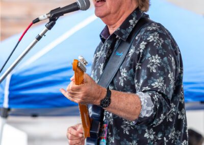 The Carl Verheyen Band performing at a festival in Sand City, CA