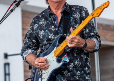 The Carl Verheyen Band performing at a festival in Sand City, CA