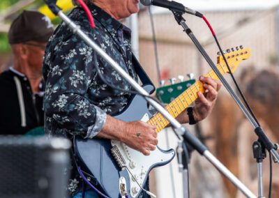 The Carl Verheyen Band performing at a festival in Sand City, CA