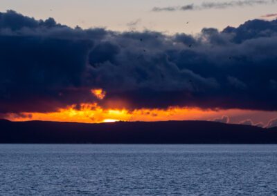 A cloudy sunrise over the shores of San Francisco Bay